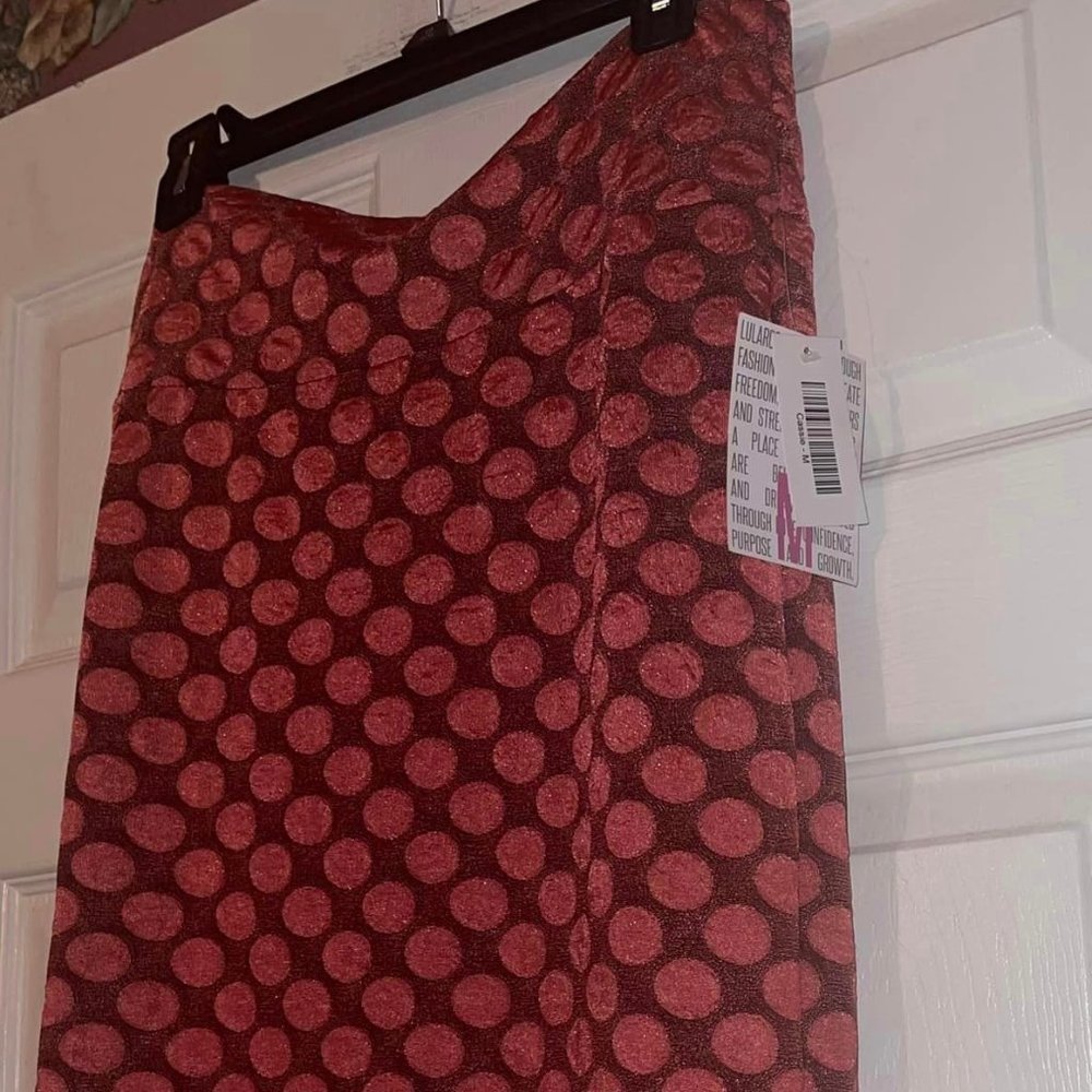 Women's skirt LULA ROE..  Size M. New with tags..  Knee length..  Orange color..